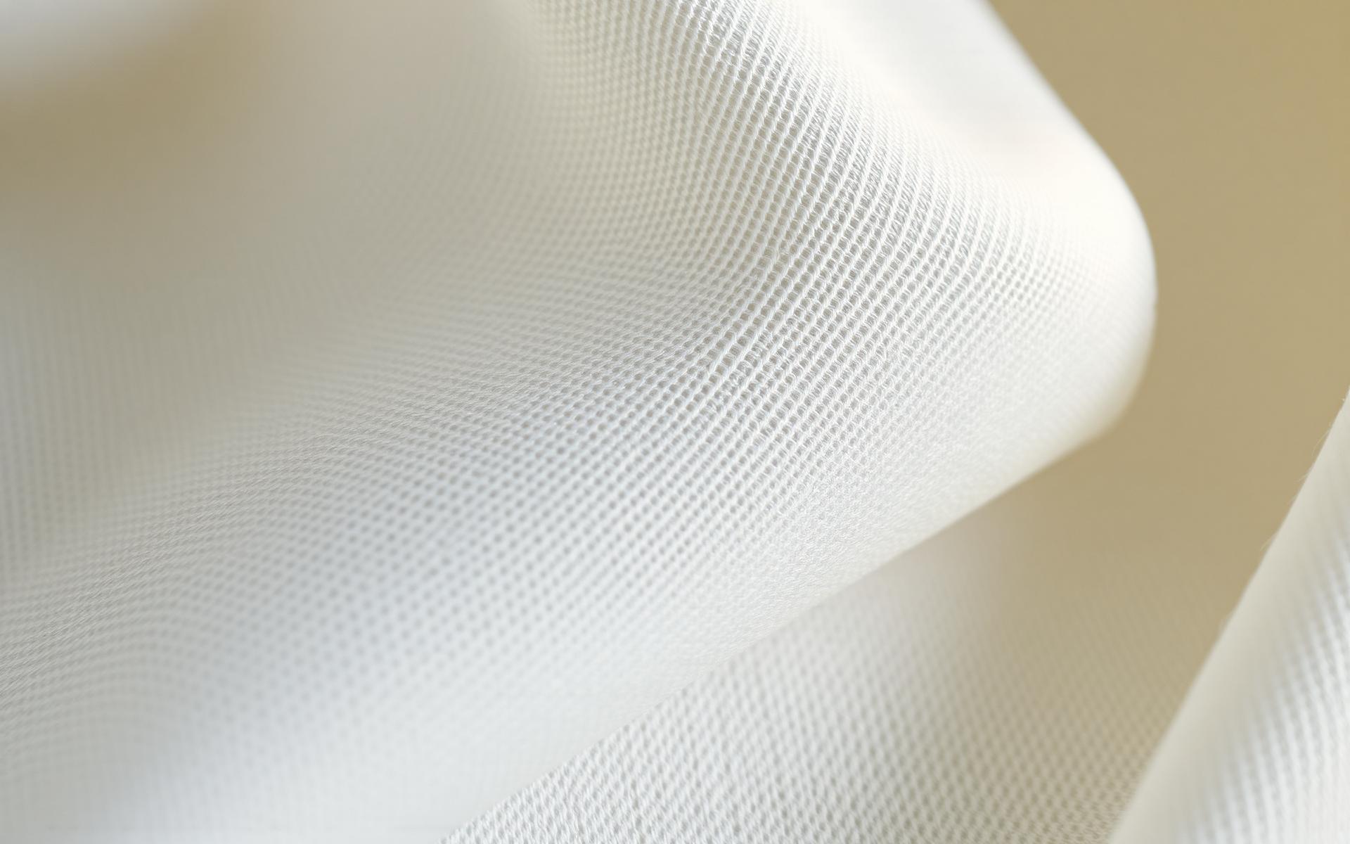 Macro close-up of premium cotton linen weave